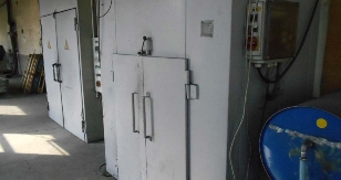 Pre-treatment system with powder coating booths