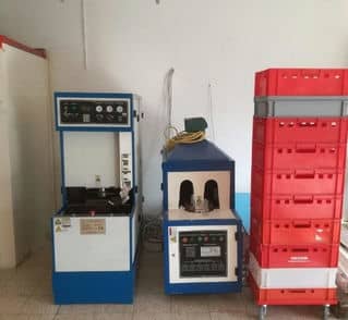 Bottle blowing machine preheater and inflation unit